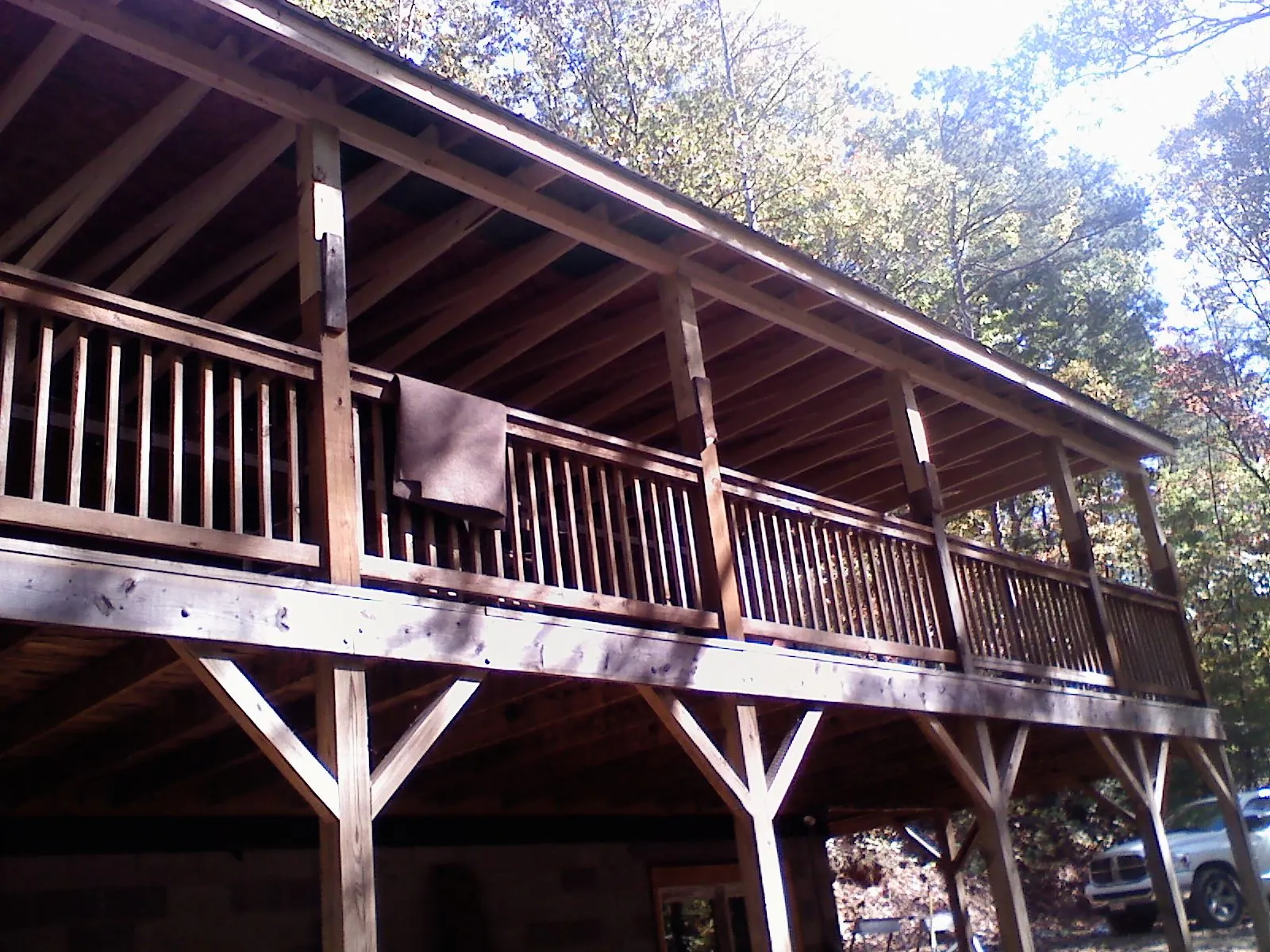 Timber framing under a new elevated porch and deck — Roof Leak Repair in New Haven by Roofing Brothers